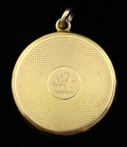 Gold locket inset with portrait of a lady, the case stamped 15ct, Engraved with Powell crest, 2.5 cmsAs with all  items from 