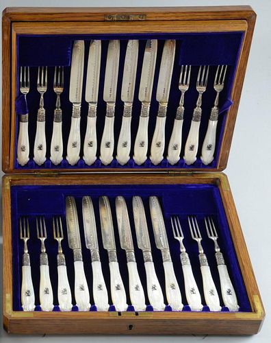 Set of twenty-four George V silver and mother of pearl handled fruit knives and forks, by James Dixon & Sons Ltd., Sheffield,