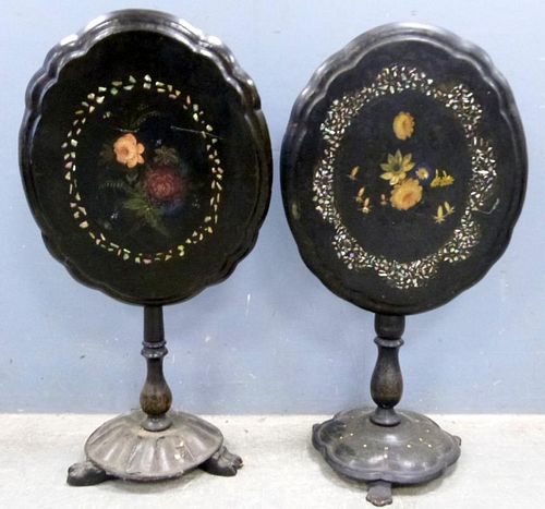 Two Victorian black lacquered papier mache and wood tables with oval shaped tops and mother of pearl and floral painted decor
