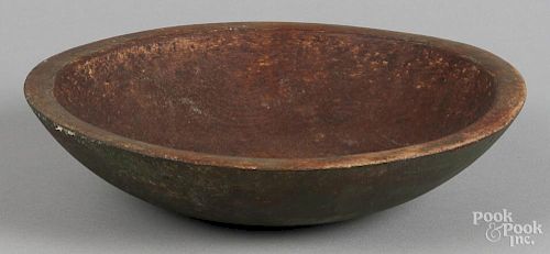 Small turned bowl, 19th c., retaining a green surface, 2'' h., 9'' dia.