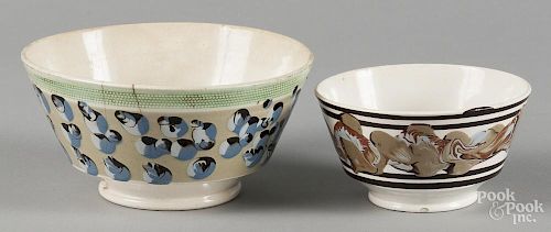Two mocha bowls, 19th c., 3'' h., 5 1/2'' dia. and 3 1/2'' h., 7 1/4'' dia.