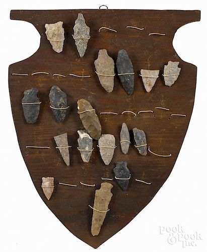 Pair of plaques with mounted arrowheads, 13 1/2'' h.