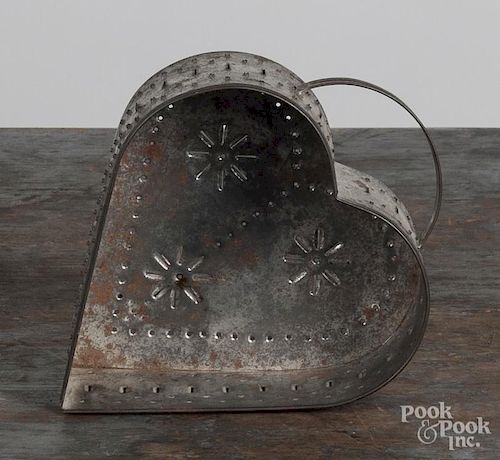Tin heart-shaped cheese strainer, 6 1/2'' h., 5 1/4'' w.