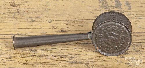 Early American embossed tin baby rattle/whistle, 19th c., with an image of an eagle