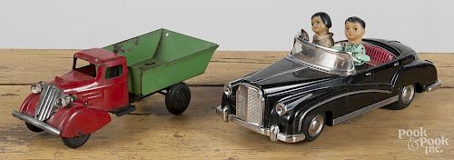 Chinese battery operated car with a photographer, 12 1/4'' l.