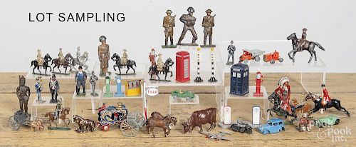 Large group of lead and spelter toy soldiers and train figures.