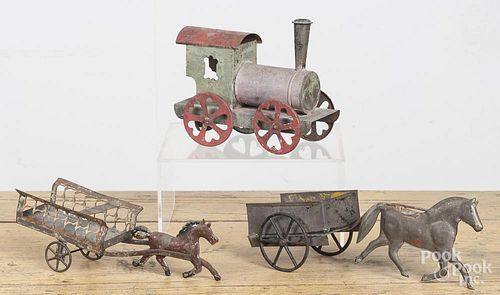 Three early American tin toys, to include a wind-up train engine, 7 1/4'' l.