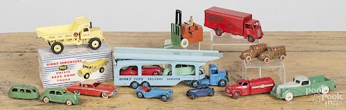 Eight Dinky Toy vehicles, together with a Hubley Kiddie Toy truck, a cast iron car and camper