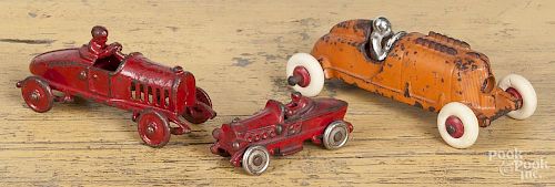 Three cast iron racers with drivers, largest - 6 1/4'' l.