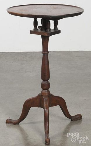 Walnut candlestand, late 19th c., with a birdcage support, 28'' h., 17 1/4'' w.
