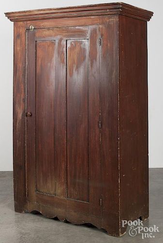 Painted pine wall cupboard, mid 19th c., retaining an old red grained surface, 72 1/2'' h., 42'' w.
