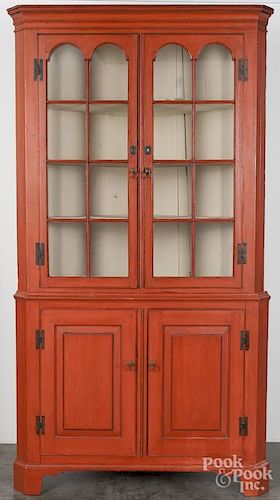 Pennsylvania painted pine and poplar two-part corner cupboard, early 19th c.