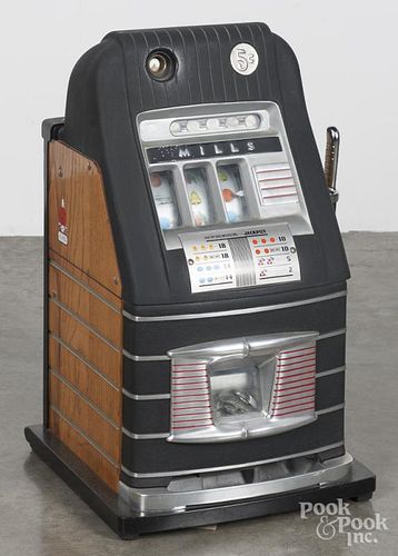 Mills five-cent high top slot machine, 20th c., 27'' h.