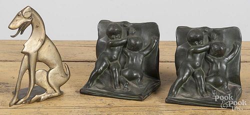 Pair of bronze bookends, early 20th c., 5 1/4'' h., together with a brass art nouveau hound, stamped