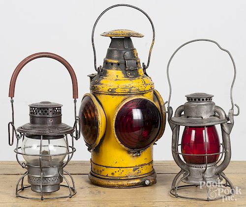 Three railroad lamps, ca. 1900, to include a PRR Dressel marker light, 16'' h.