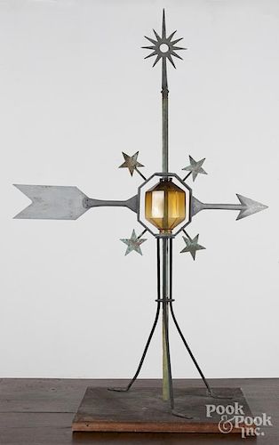 Aluminum weathervane arrow, 20th c., with an octagonal amber colored lightning ball