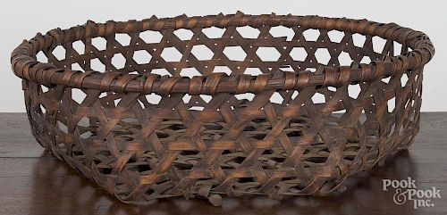 Split oak cheese basket, late 19th c., 6 1/2'' h., 24 1/2'' w.