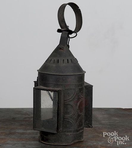 Punched tin lantern, 19th c., 17'' h. Provenance: Titus Geesey.