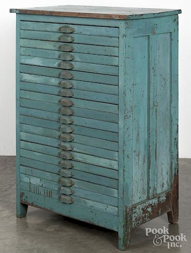 Painted mixed wood printer's cabinet, ca. 1900, having twenty drawers, with a later blue surface