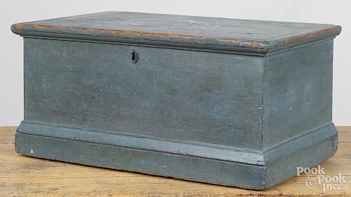 Painted pine document box, 19th c., retaining a blue surface, 10 1/2'' h., 22 3/4'' w.