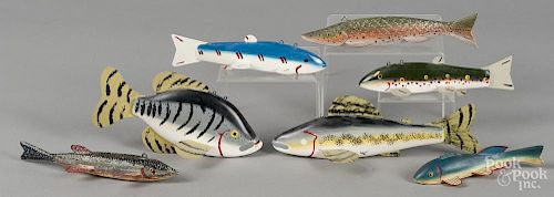 Seven contemporary carved and painted fish decoys, longest - 7 3/4''.