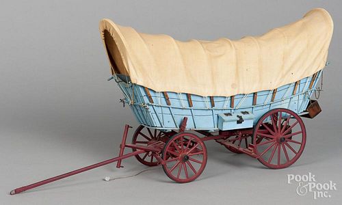 Painted wood model of a Conestoga wagon, mid 20th c., 24'' l.