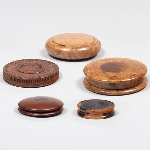 Group of Five English and Continental Burlwood, and Lignum Vitae Circular Snuff Boxes