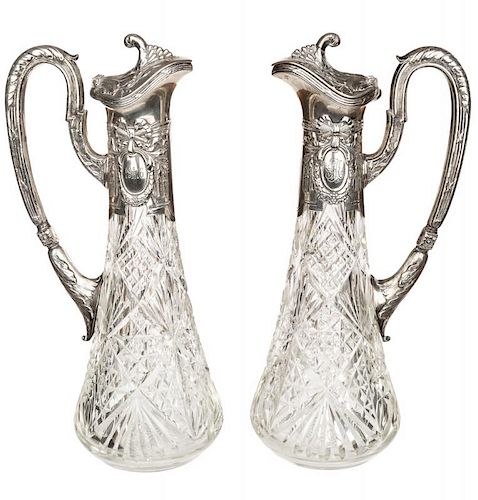 A PAIR OF SILVER-MOUNTED CUT GLASS DECANTERS, KHLEBNIKOV WITH THE IMPERIAL WARRANT, MOSCOW, CIRCA 1916