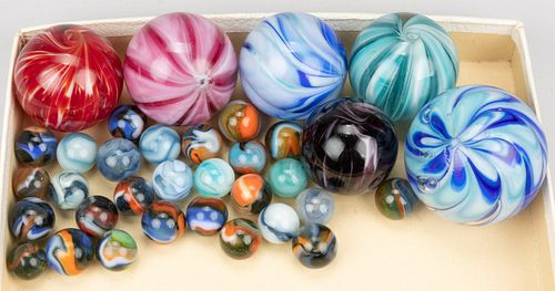 ASSORTED VINTAGE MACHINE-MADE AND CONTEMPORARY HAND BLOWN GLASS MARBLES, LOT OF 34