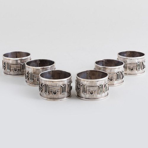 Set of Six Silver Plate Napkin Rings with Zodiac Symbols