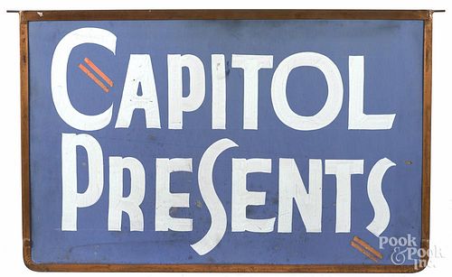 Two painted cardboard theater signs, 20th c., with copper frames, inscribed Capitol Presents