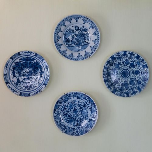 Four Blue and White Delft Plates