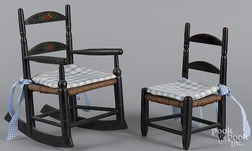 Two painted rush seat doll chairs, 19th c., 14'' h., and 16 1/2'' h.