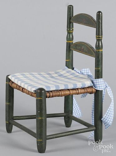 Painted pine rush seat doll chair, 19th c., with the original green surface, 15 1/2'' h.