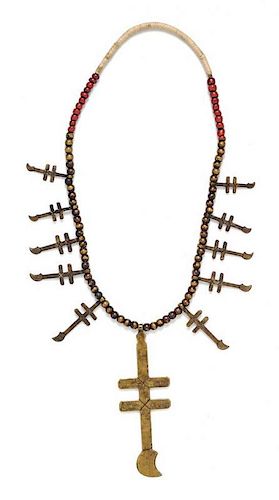 * A Bronze Isleta Dragonfly Cross Necklace, 63.60 dwts.