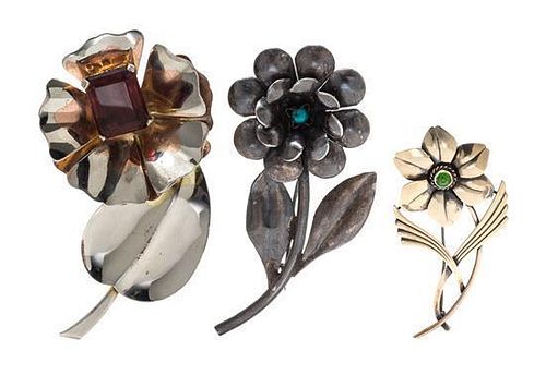 A Collection of Sterling Silver, Gemstone and Glass Flower Motif Brooches, 47.70 dwts.