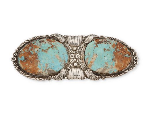 A large Navajo silver and turquoise belt buckle