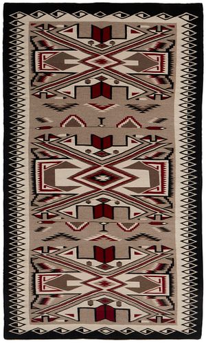 A large framed Navajo Teec Nos Pos rug