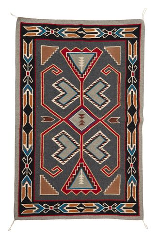 A Navajo Teec Nos Pos saddle blanket