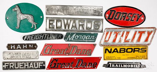 Collection of trucking signs/emblems and placards