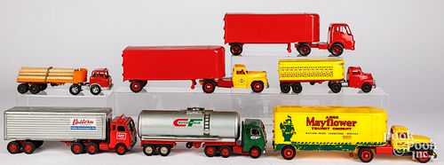 Seven vintage tractor trailer toys