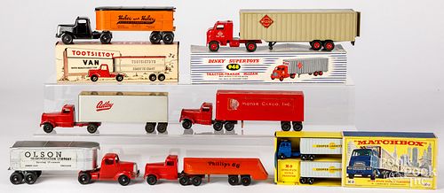 Group of small tractor trailer toys