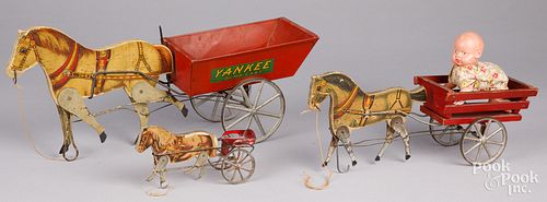 Three Gibbs horse drawn carts