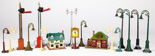 Group of Lionel street lights, houses, and signals