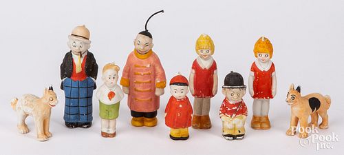 Nine bisque comic character toy nodders
