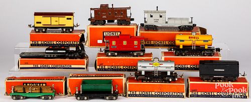 Ten Lionel train cars, 0 gauge, in original boxes