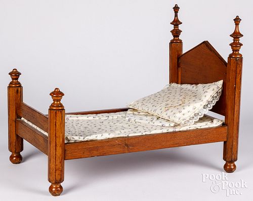 Walnut doll bed, late 19th c.