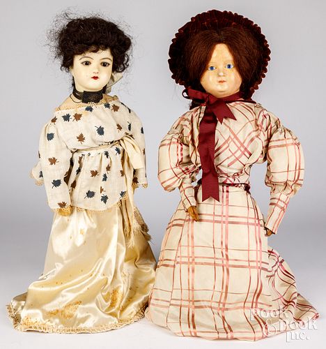 Three wax dolls, with glass eyes