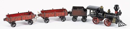 Cast iron floor train, to include a tender and two C. P. P. R. gondola cars, engine - 7 1/2'' l.
