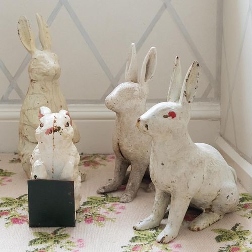 Group of Four Painted Iron Bunny Form Doorstops